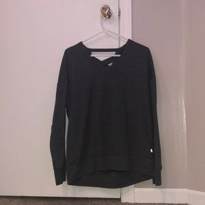 grey long sleeve tee shirt with open crisscross open back
